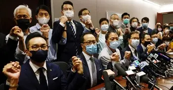 China says HK opposition walkout is open challenge