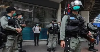 Riot police flood Hong Kong as China protests grow