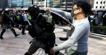 HK suspends all schools amid tense protests