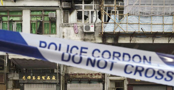 Fire in Hong Kong apartment building kills 7, injures 11