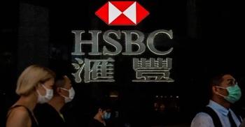 HSBC looks to Asia after profits plunge 34%