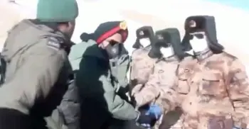 India, China agree to pull back troops from disputed lake