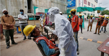 India reports record daily jump of 95,735 coronavirus cases