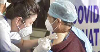 52 show adverse reactions COVID-19 vaccine shot in Delhi