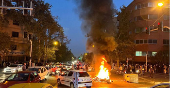 Iran says issues first death sentence over protests