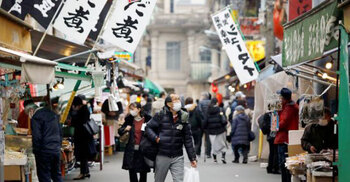 Japan bans new entries of foreigners after virus variant arrives