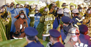 Man with knife injures 17 people on Tokyo train, starts fire