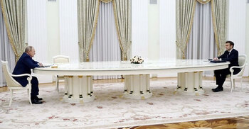 Macron says Putin pledges no new Ukraine escalation