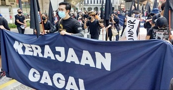 Malaysian youths demand PM quit as pandemic worsens