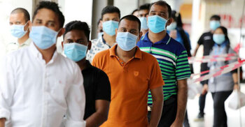 Malaysia says undocumented migrants will not be arrested during COVID vaccination
