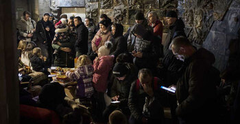 Russians push deeper into Mariupol as locals plead for help