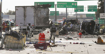 19 dead in Mexico when truck crashes into cars at toll booth