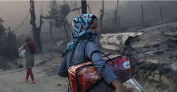 Fire destroys Greece's largest migrant camp