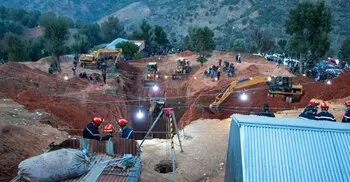 Moroccan rescuers inch nearer to boy stuck in well for days