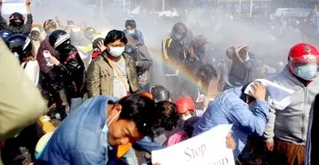 Myanmar ruler calls for end to protests, sanctions loom