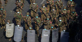 Myanmar police fire stun grenades as Southeast Asian ministers aim for talks