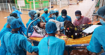 Myanmar floods, coup, complicate growing Covid-19 outbreak