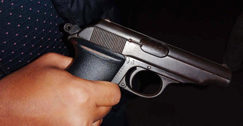 নৈশকোচ থেকে অস্ত্র-গুলিসহ দুই যুবক আটক