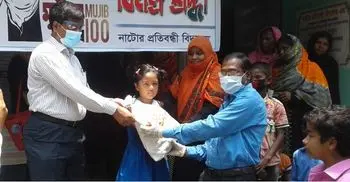 PRAN-RFL distributes food in Natore
