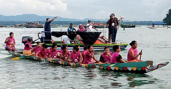 কাপ্তাই হ্রদে নৌকাবাইচে সম্প্রীতির মেলা
