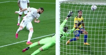 Benzema double takes Real Madrid top