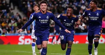 Real ease past Sociedad to open eight-point lead