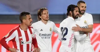 Benzema sends Real level at top of table