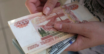 Russian rouble plunges after new sanctions announced