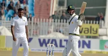 Masood fifty helps Pakistan progress smoothly