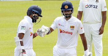 Karunaratne, Thirimanne guide Sri Lanka to cautious start on first morning