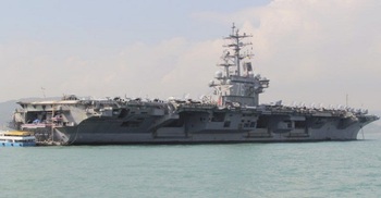 US Navy says carrier group operating in South China Sea