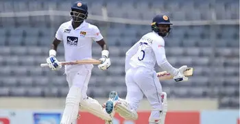 Mathews, Karunaratne deny Bangladesh on rain-hit day