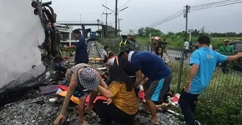 Many reported dead in Thailand bus-train collision
