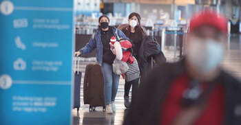 Biden says travel bans will stay despite Trump order