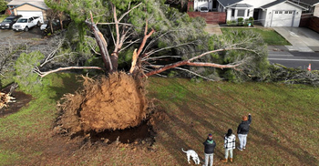 California braces for ‘parade of cyclones’ after storms kill 12