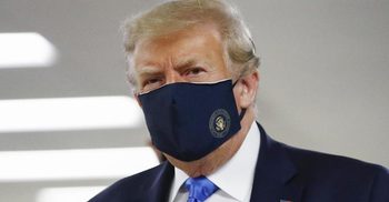 Trump vows not to order Americans to wear masks