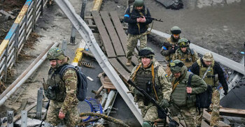 Ukraine says Russian forces pushed back around Kyiv but fighting rages