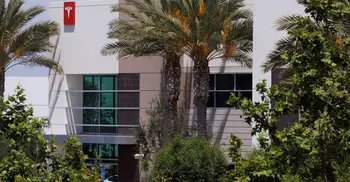Tesla sued by former employees over 'mass layoff'