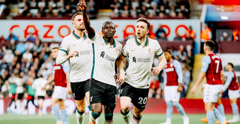Liverpool win at Villa to keep title hopes alive
