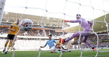 Early Grealish, Haaland goals ease Man City to win at Wolves