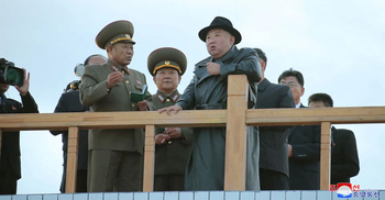 North Korea fires missile, flies warplanes near border