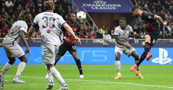Giroud double helps AC Milan secure last-16 place