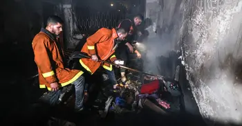Fire in Gaza residential building kills 21