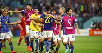 Japan roar back again to shock Spain and top group