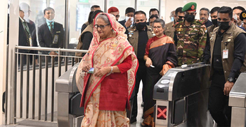 PM becomes first passenger to travel on Metro Rail