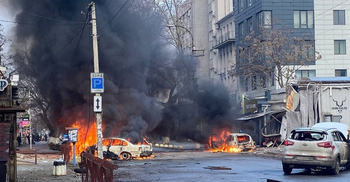 Explosions rock Ukrainian cities as Russia launches 'more than 100 missiles' in waves