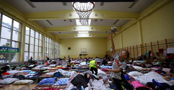 UNHCR head estimates 2.1-2.2 million fled Ukraine