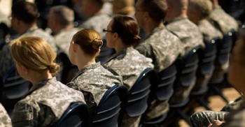 Ponytails and lipstick: US women soldiers get style