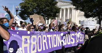 Biden lifts abortion referral ban on family planning clinics