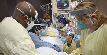 US virus deaths hit record levels with the holidays ahead